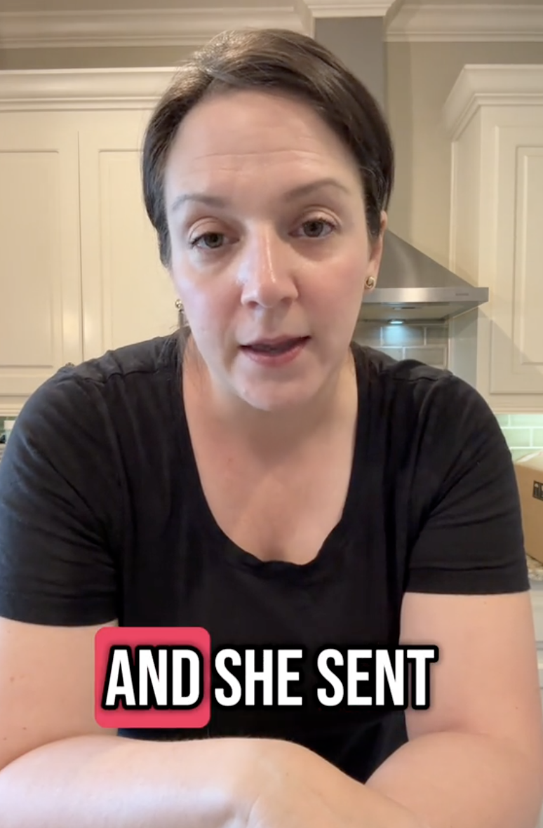 woman talking in her kitchen